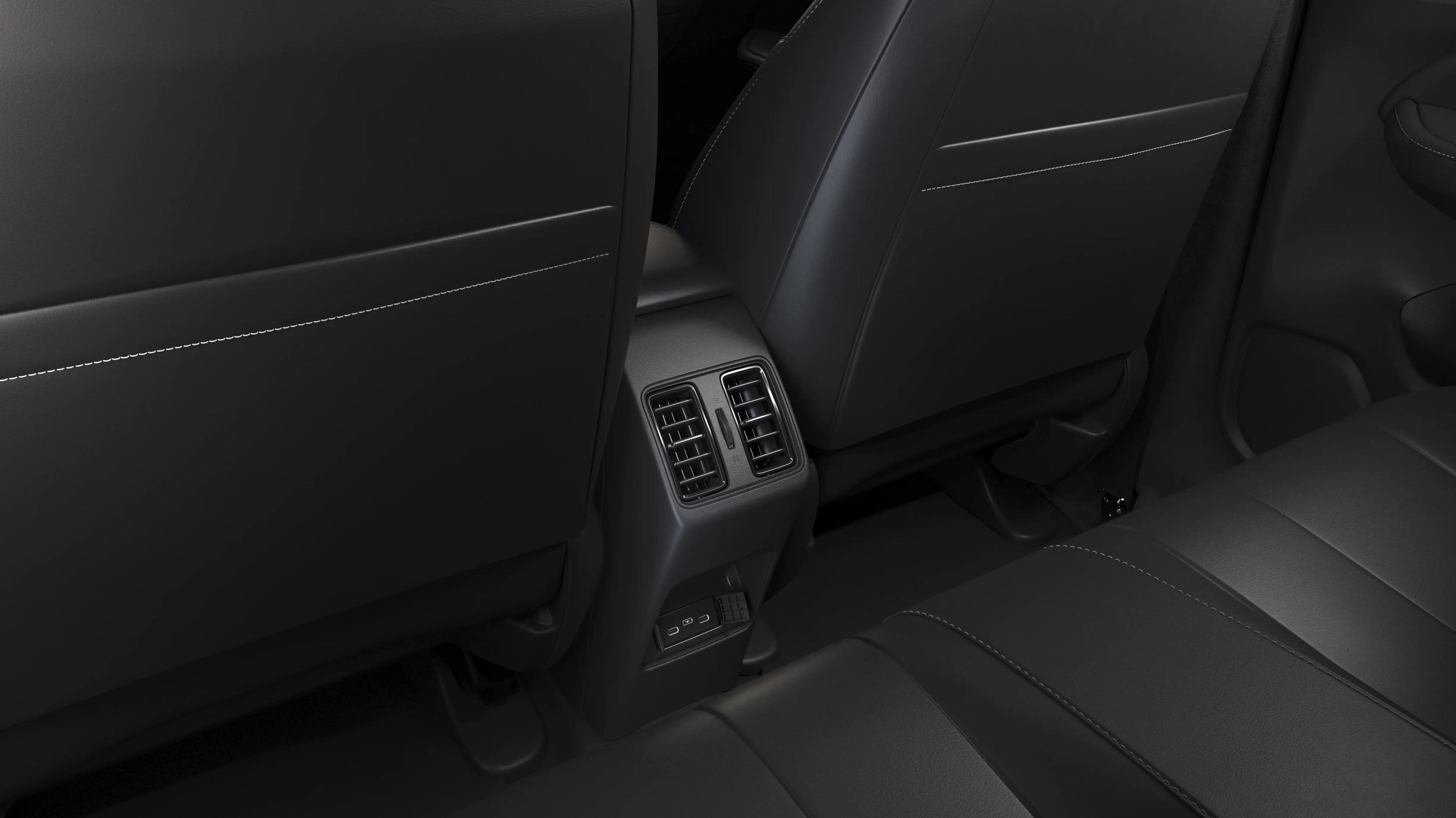 Salida de Aire y USB Trasero